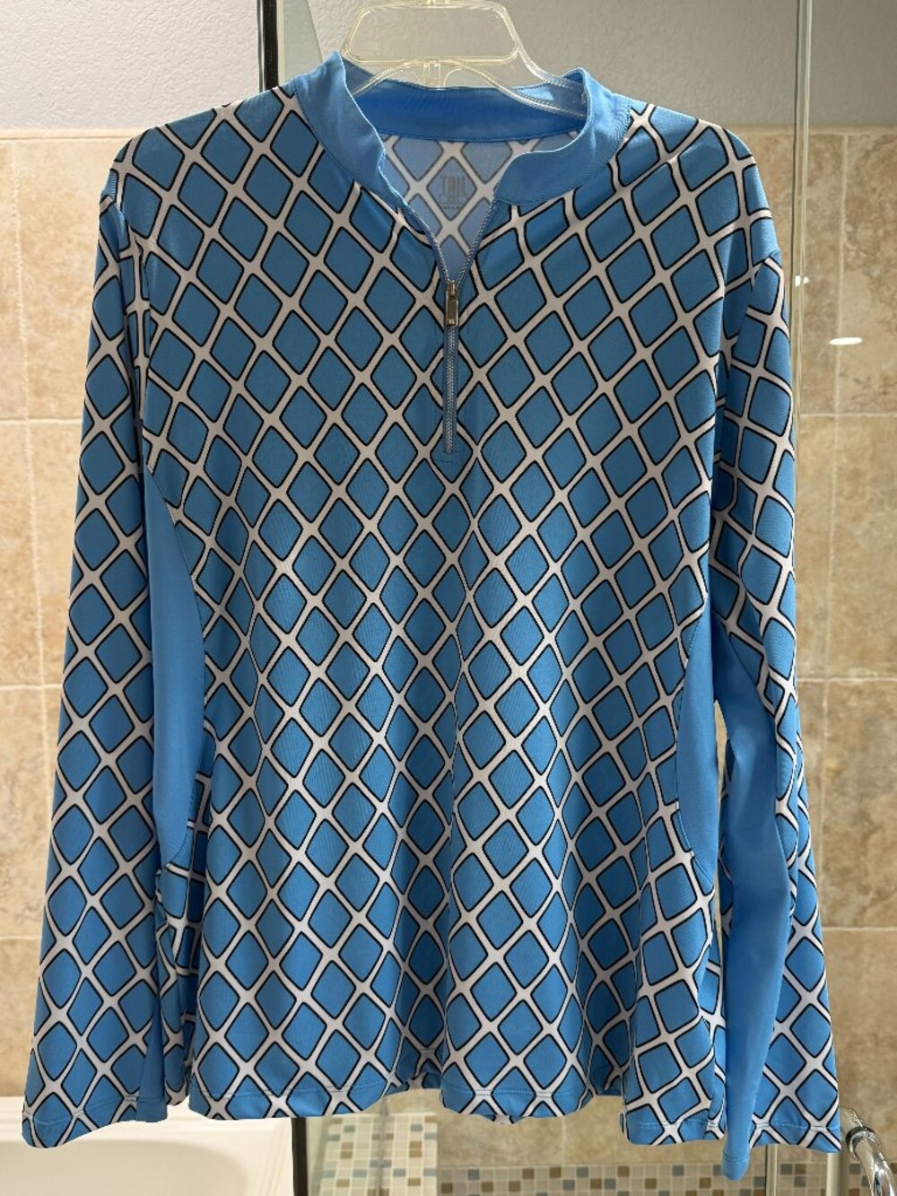 Tail Size XXL Blue and white with black shirt like new, hardly worn. Long Sleeve